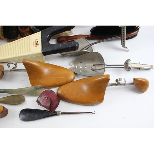 498 - A collection of early/mid 20th century vanity items to include boxed Foot Aid home shoe stretcher, c... 