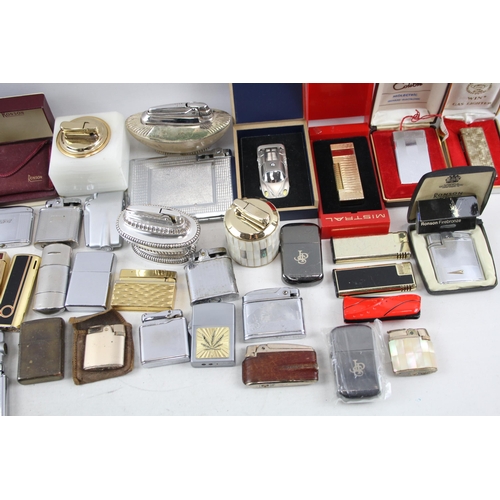 501 - A large collection of lighters to include Ronson, Rolstar, Colibri, Zippo etc.