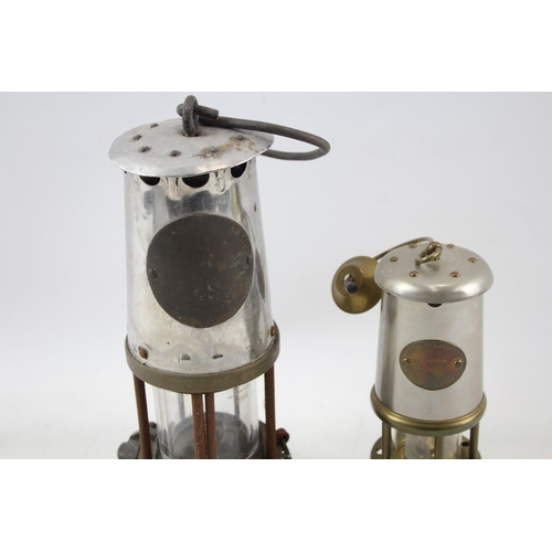 503 - Two miner's lamps, one Lamp & Limelight Company Hockley and one other stamped Eccles - largest appro... 