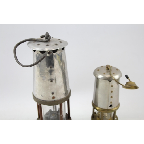 503 - Two miner's lamps, one Lamp & Limelight Company Hockley and one other stamped Eccles - largest appro... 