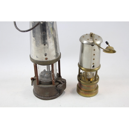 503 - Two miner's lamps, one Lamp & Limelight Company Hockley and one other stamped Eccles - largest appro... 