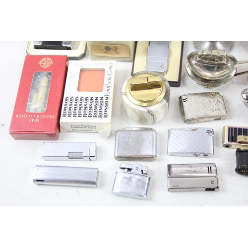 509 - A large collection of lighters to include Colibri, Ronson, Mosda etc.