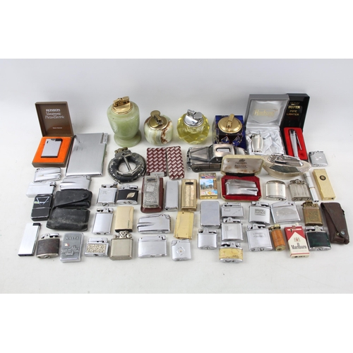 510 - A large collection of cigarette lighters to include Ronson, Hadson etc.