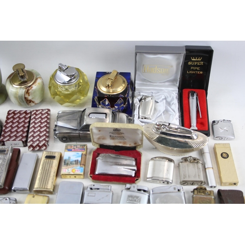 510 - A large collection of cigarette lighters to include Ronson, Hadson etc.