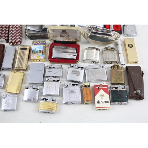 510 - A large collection of cigarette lighters to include Ronson, Hadson etc.