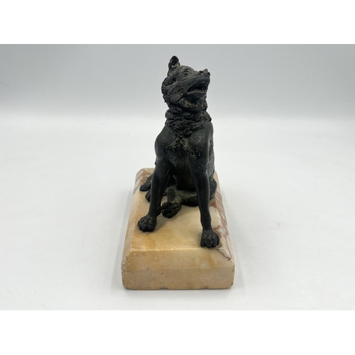 2108 - A cast metal dog figurine on marble plinth - approx. 14cm high