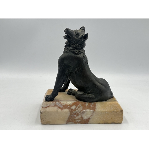 2108 - A cast metal dog figurine on marble plinth - approx. 14cm high