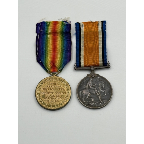 2233 - A WWI South African medal pair presented to Pte. G.W.M. Lawrence  11th S.A.I.