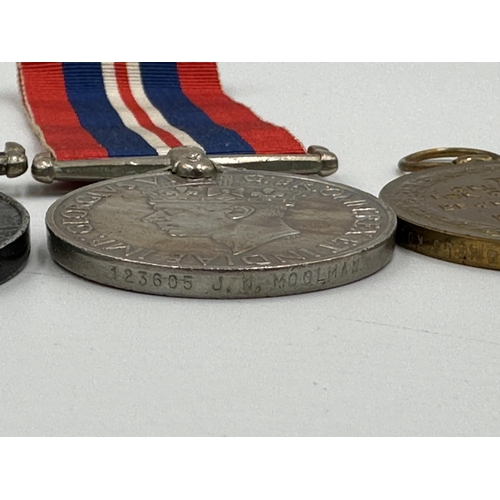 2236 - A WWI and WWII South African medal trio and pair presented to 123605 J.N. Moolman