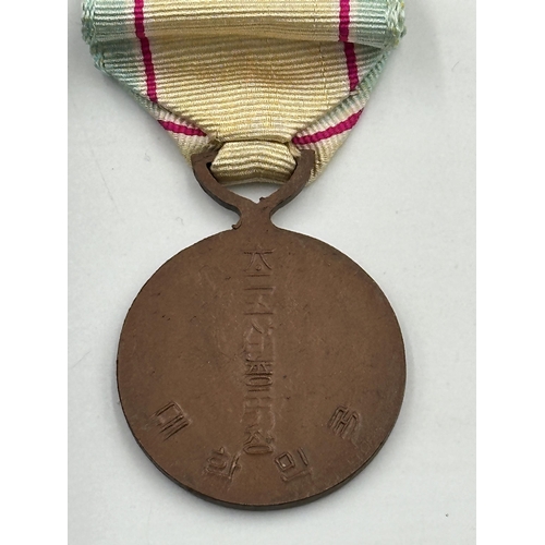 2241 - A boxed Korean War Service medal