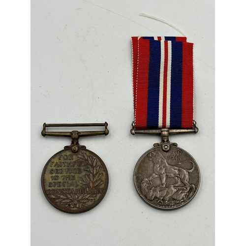 2311 - Two George VI medals, one WWII War and one For Faithful service In The Special Constabulary presente... 