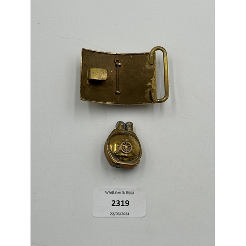 2319 - Two items, one Victorian Royal Engineers belt buckle and one brass trench art lighter