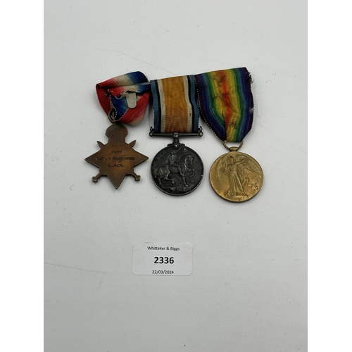 2336 - A WWI British medal trio on mount presented to 12987 L.Cpl. P. Bebbington S.Lan.R.