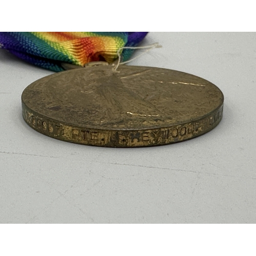 2374 - Three medals, one WWI medal pair comprising unnamed 1914-15 star and Victory presented to 30957 Pte.... 