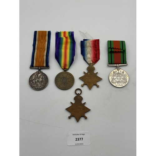 2377 - Five medals to include WWI Belgian Victory, British 1939-1945 Defence, two 1914-15 stars presented t... 