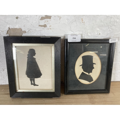 256 - Four 19th century framed silhouettes - largest approx. 19cm high x 16cm diameter