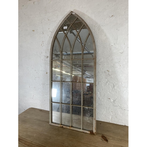 267 - A modern metal framed arched wall mirror - approx. 116cm high x 50cm wide