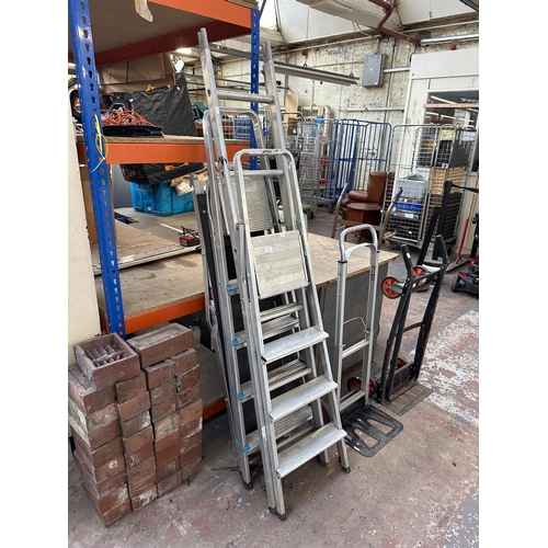 880 - Four items, three aluminium ladders and one work platform