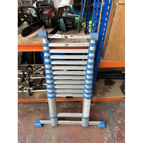 886 - A MacAllister aluminium 3.8 metre telescopic extension ladder