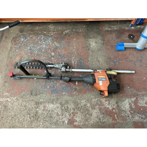 891 - A Flymo XLT3000+ petrol multitool