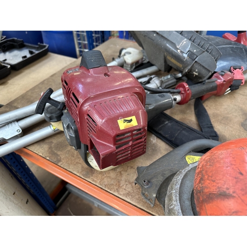 897 - Two gardening items, one Flymo Contour 500X strimmer and one Mountfield MM2605 5 in 1 petrol multito... 