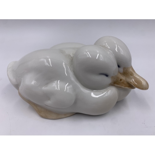 308 - Two Royal Copenhagen animal figurines, one Ducklings no. 516 and one Snowy Owl no. 1719