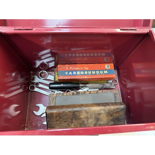 942 - A tool box with various hand tools