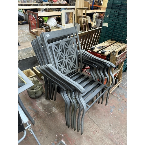 958 - Five metal garden chairs