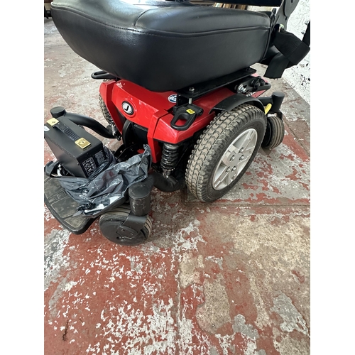 862 - A Pride Jazzy 600ES electric wheelchair with charger