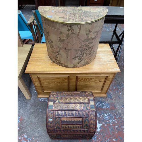 104 - Three blanket/storage boxes, one pine, one Arnold Designs Ltd. fibreglass and one straw dome top