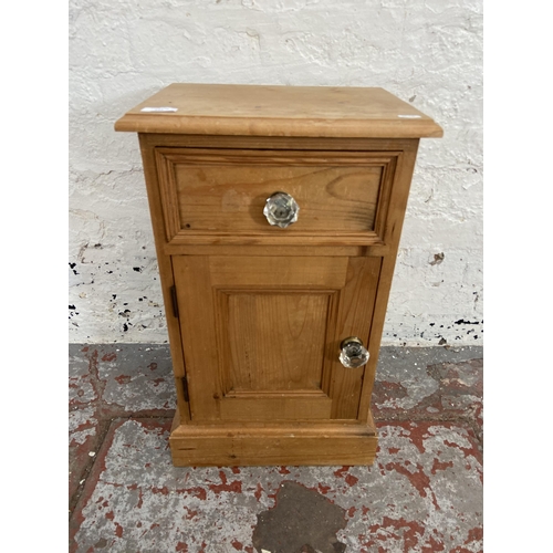 107 - A Victorian style pine bedside cabinet - approx. 61cm high x 46 cm wide x 28cm deep