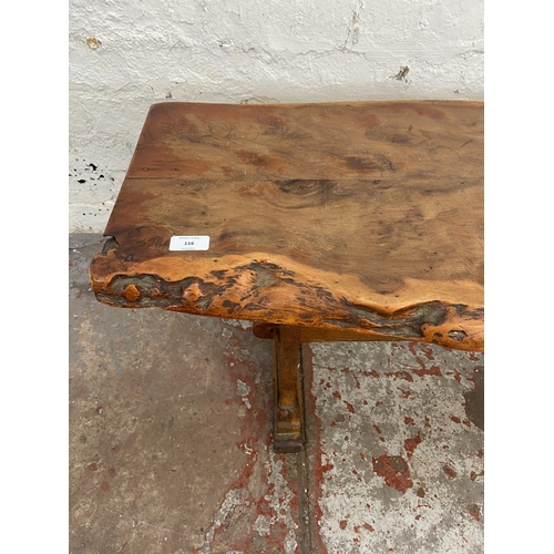 116 - A yew wood tree slice coffee table on oak base - approx. 44cm high x 43cm wide x 125cm long