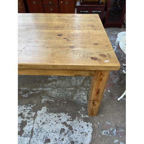 117 - A modern solid pine rectangular dining table - approx. 79cm high x 108cm wide x 230cm long