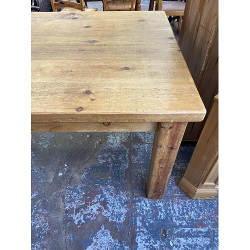 117 - A modern solid pine rectangular dining table - approx. 79cm high x 108cm wide x 230cm long