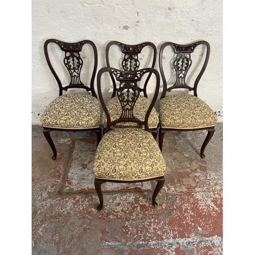 118 - Four late Victorian/Edwardian carved mahogany and floral fabric upholstered dining chairs