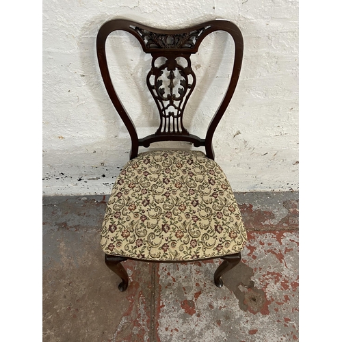 118 - Four late Victorian/Edwardian carved mahogany and floral fabric upholstered dining chairs