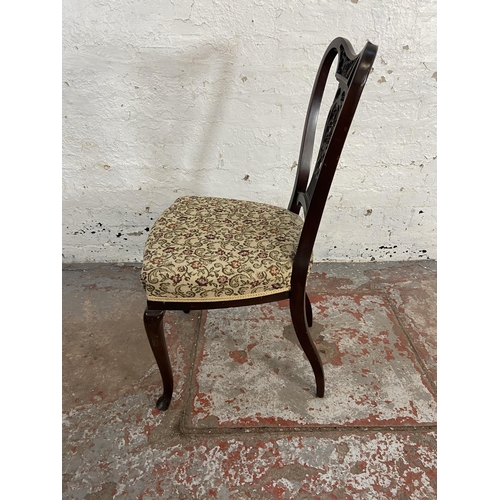 118 - Four late Victorian/Edwardian carved mahogany and floral fabric upholstered dining chairs