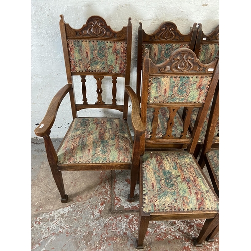 121 - Six Arts & Crafts carved oak and fabric upholstered dining chairs