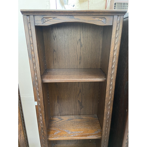 135 - A Jaycee carved oak three tier bookcase - approx. 200cm high x 51cm wide x 30cm deep