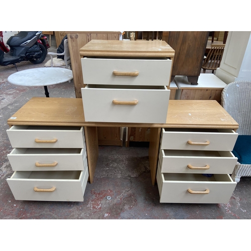 139 - A mid/late 20th century oak effect and white laminate dressing table and bedside cabinet