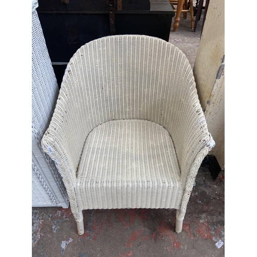 140 - Five pieces of white painted woven furniture to include Lloyd Loom corner linen basket, W. Lusty & S... 