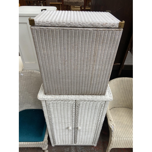 140 - Five pieces of white painted woven furniture to include Lloyd Loom corner linen basket, W. Lusty & S... 