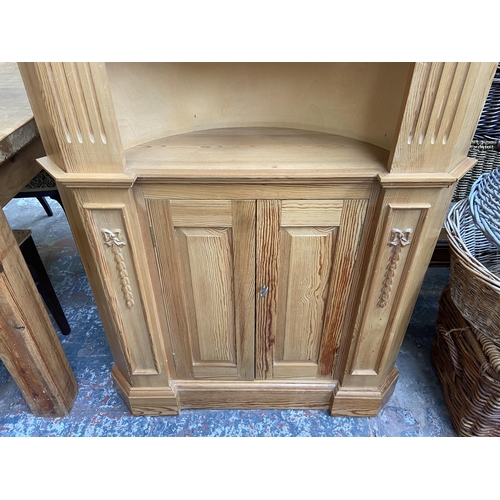 142 - A 19th century style carved pine free standing corner cabinet - approx. 206cm high x 94cm wide