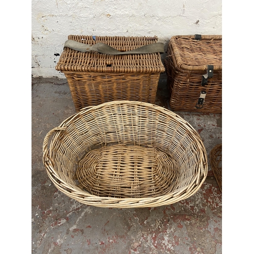 143 - Seven pieces of wicker furniture to include fishing basket, child's chair etc.