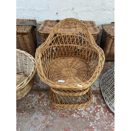 143 - Seven pieces of wicker furniture to include fishing basket, child's chair etc.