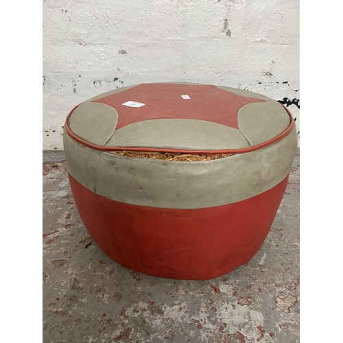 145 - A mid 20th century red and grey vinyl circular footstool - approx. 25cm high x 40cm diameter