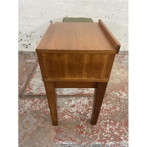 146 - A mid 20 century teak telephone table - approx. 59cm high x 96cm wide x 31cm deep