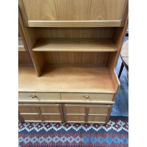 155 - A mid 20th century Nathan teak display cabinet - approx. 194cm high x 153cm wide x 45cm deep