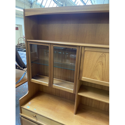 155 - A mid 20th century Nathan teak display cabinet - approx. 194cm high x 153cm wide x 45cm deep