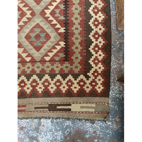 156 - A mid 20th century Kilim rug - approx. 227cm x 166cm